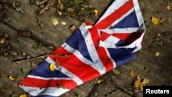 A British flag which was washed away by heavy rains in London on June 24, 2016.