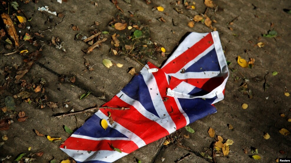 A British flag which was washed away by heavy rains in London on June 24, 2016. (Reuters)