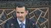 شام: مظاہرے جاری، نئی حکومت تشکیل دینے کا اعلان