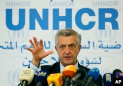 FILE - Filippo Grandi, U.N. High Commissioner for Refugees, gestures as he speaks during a press conference, in Beirut, Lebanon, Friday, Aug. 31, 2018.