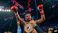 ဖိလစ်ပိုင် လက်ဝှေ့ကျော် Manny Pacquiao။ 