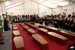 A view of the tent where a funeral service for 24 migrants drowned while trying to reach the Southern coasts of Italy took place, in Msida, in the outskirts of Valletta, Malta, April 23, 2015.