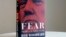 A copy of Bob Woodward's "Fear" is photographed Wednesday, Sept. 5, 2018, in New York. It's not clear whether President Donald Trump has much to fear from "Fear" itself. 