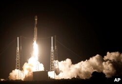 A Falcon 9 SpaceX rocket lifts off from the Cape Canaveral Air Force Station Complex 40 launch pad in Cape Canaveral, Fla., Tuesday, Aug. 7, 2018.