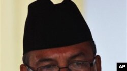 Nepal's newly elected Prime Minister Jhalnath Khanal looks on after his swearing-in ceremony in Katmandu, Nepal, Sunday, Feb. 6, 2011.