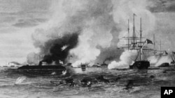The Virginia (background center) and the Merrimack (left) battled in the waters off Hampton Roads, Virginia. 