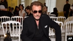 French rock singer Johnny Hallyday, seen in this July 4, 2016 photo, is being treated in a Paris hospital for respiratory difficulties, French television station BFM reported on Friday, Nov. 17, 2017.