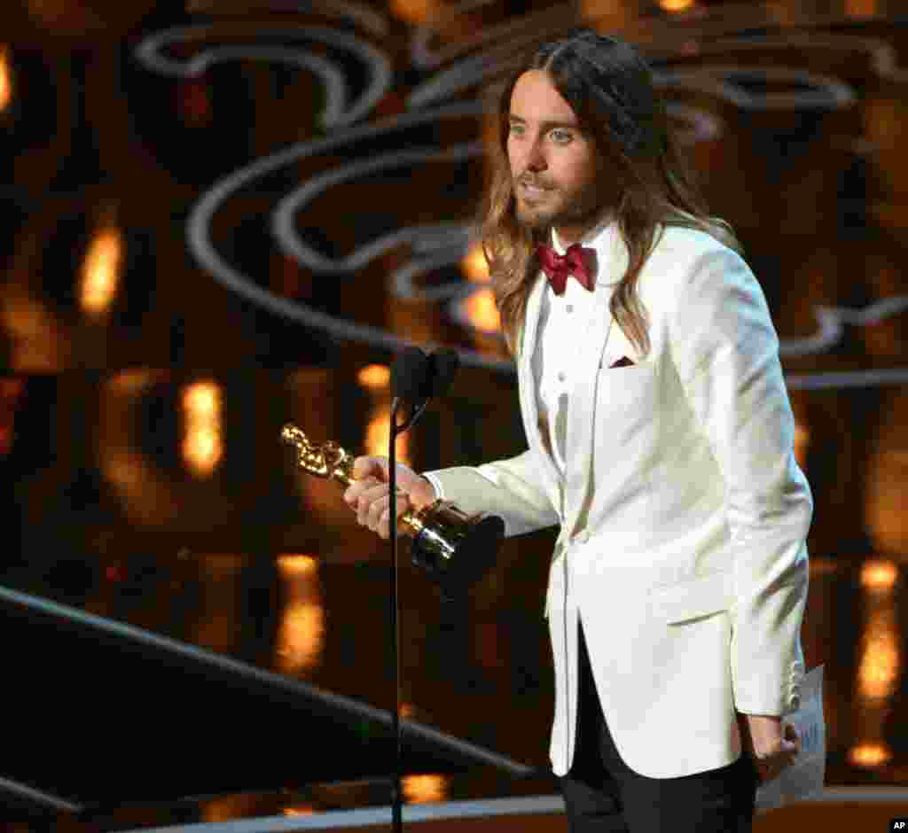 Jared Leto accepts the award for best actor in a supporting role for “Dallas Buyers Club” during the Oscars at the Dolby Theatre on March 2, 2014, in Los Angeles. 