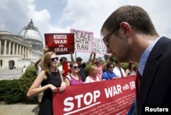 Activists deliver more than 400,000 petition signatures to Capitol Hill in support of the Iran nuclear deal in Washington, July 29, 2015.