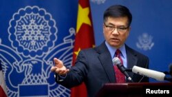 U.S. Ambassador Gary Locke answers a question after his farewell speech at Beijing American Center in Beijing February 26, 2014. China's future development will hinge on a neutral judiciary and freedom of speech, Locke said on Wednesday in his final speec
