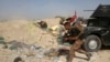 Les troupes peinent à avancer dans Fallouja en Irak, 20.000 enfants bloqués