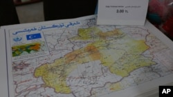 FILE - A map showing "East Turkistan," the name Uighurs who oppose Chinese rule call their homeland, a region China refers to as Xinjiang, is seen at a bookstore in Istanbul's Zeytinburnu neighborhood, Dec. 14, 2017.