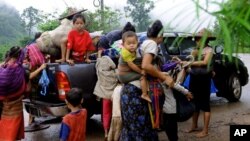 FILE - Ethnic Karen have abandoned a camp and villages in eastern Burma to seek refuge in Thailand following government attacks on ethnic insurgents.