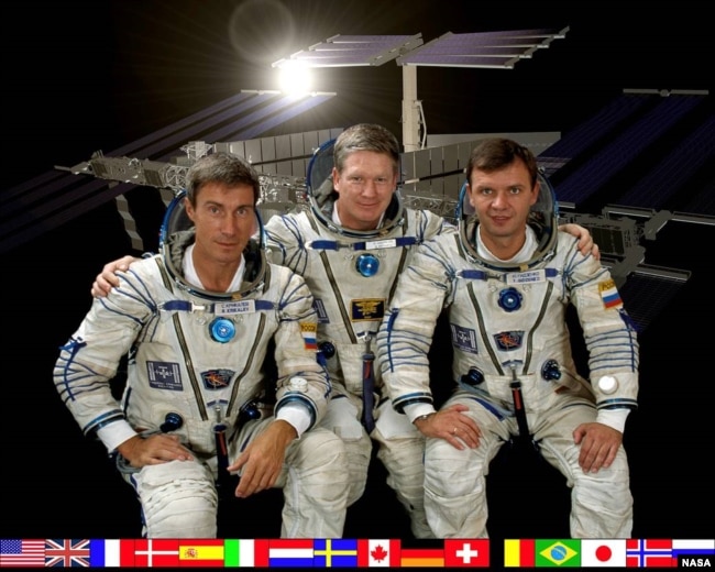 FILE - From left, Russia's Sergei Krikalev, American Bill Shepherd and Russia's Yuri Gidzenko are the first astronauts to live in the International Space Station in 2000. (Photo courtesy of NASA)