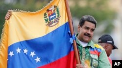 El presidente venezolano Nicolás Maduro cerró su campaña presidencial para las elecciones del domingo con un acto en Caracas el jueves, 17 de mayo, de 2018.