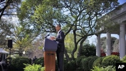 President Barack Obama urges Congress to eliminate tax breaks for oil and gas companies, in the Rose Garden of the White House in Washington, March 29, 2012.
