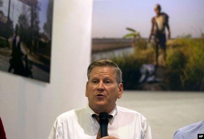 Phil Robertson, deputy Asia director at Human Rights Watch, talks to journalists during a press briefing on a project titled "Nothing for Our Land," July 17, 2018, in Yangon, Myanmar.