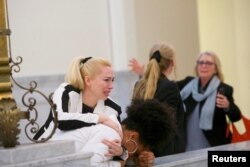 Bill Cosby accusers (L-R) Caroline Heldman, Lili Bernard and Victoria Valentino (R) react after the guilty on all counts decision was announced in the April 2018 sexual assault trial in Norristown, Pennsylvania.