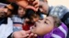 A girl is given vitamin A drops during a house-to-house vaccination campaign in Sana'a, Yemen Feb. 20, 2017. A new study found that many of those who develop TB are deficient in the nutrient. 