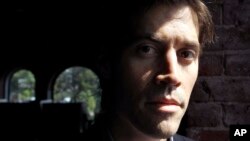 Nhà báo Mỹ James Foley bị nhóm Nhà nước Hồi giáo giết chết ở Syria.