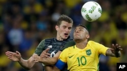 Germany's Sven Bender, left, and Brazil's Neymar go for a header during the final match of the men's Olympic football tournament won by Brazil in Rio de Janeiro, Aug. 20, 2016. 