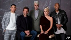 Bradley Cooper, seated left, cast member and director of the film "A Star is Born," poses with actors, from left, Anthony Ramos, Sam Elliott, Lady Gaga and Dave Chappelle at the Four Seasons Hotel during the Toronto International Film Festival in Toronto, Sept. 9, 2019.