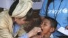 FILE - Renowned Japanese actress Tetsuko Kuroyanagi who is a UNICEF Goodwill Ambassador gives an Indonesian boy a measles vaccination Thursday Feb. 3, 2005 in the remote village of Keudai Tenom on Aceh's West coast.