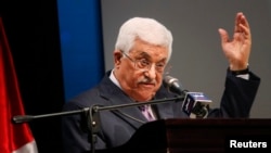 Presiden Palestina Mahmoud Abbas dalam upacara pembukaan pameran kota Ramallah, Tepi Barat.