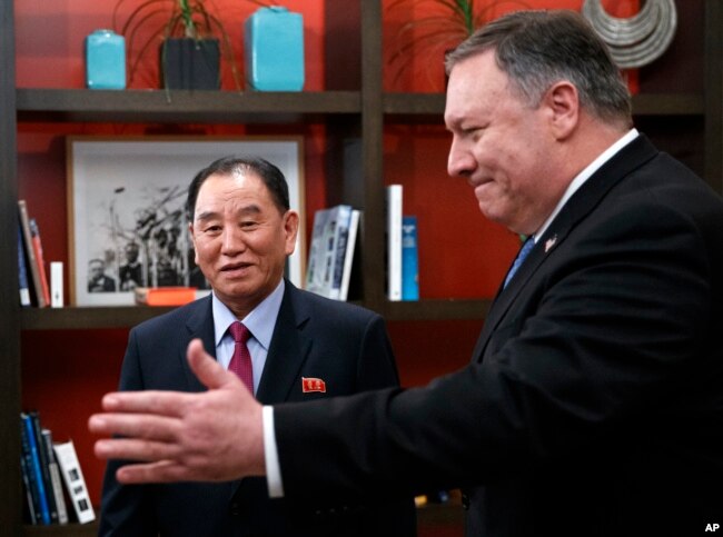 Secretary of State Mike Pompeo, right, and Kim Yong Chol, a North Korean senior ruling party official and former intelligence chief, walk from a photo opportunity at the The Dupont Circle Hotel in Washington, Jan. 18, 2019.