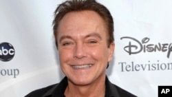 FILE - In this Aug. 8, 2009, file photo, actor-singer David Cassidy arrives at the ABC Disney Summer press tour party in Pasadena, Calif. Former teen idol Cassidy of "The Partridge Family" fame has died at age 67, publicist said Tuesday, Nov. 21, 2017.