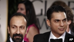 Director Asghar Farhadi (left) and Actor Peyman Moadi arrive at the Golden Globes.