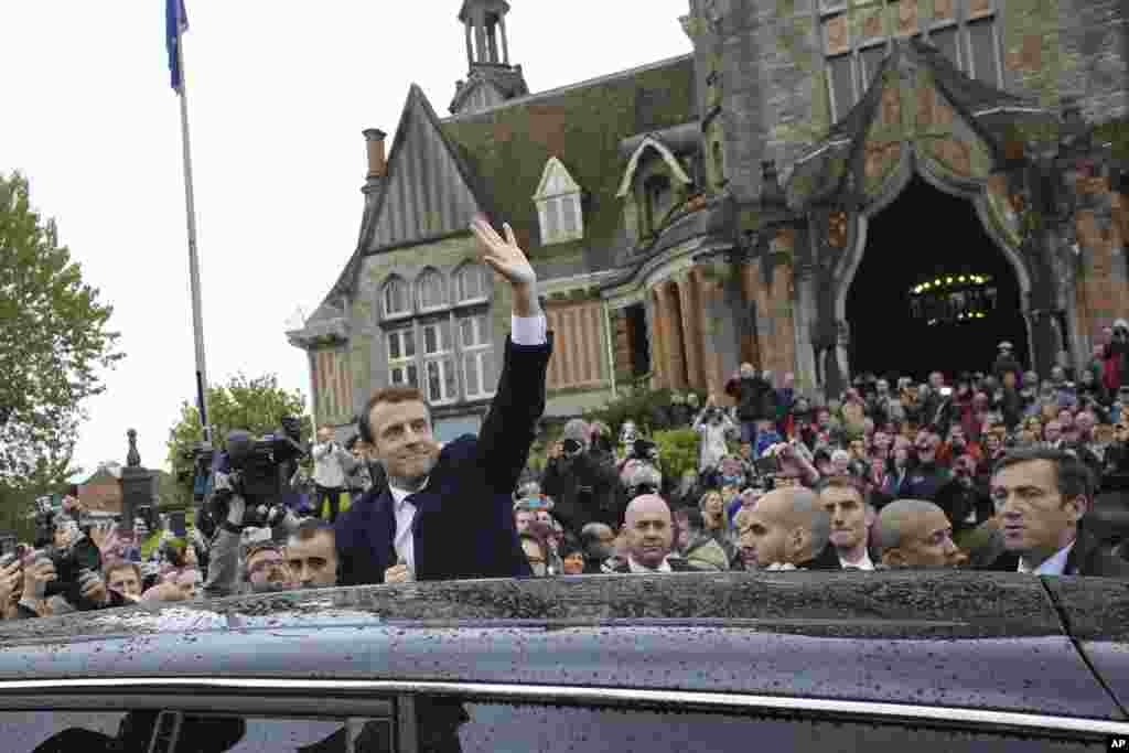 French independent centrist presidential candidate Emmanuel Macron as he leaves the polling station after casting his ballot in Le Touquet, May 7, 2017.