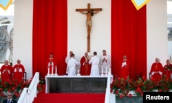 Pope Francis leads a mass for Catholic faithful in the city of Holguin, Cuba, Sept. 21, 2015.
