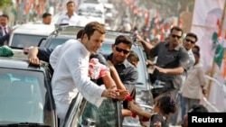 FILE - Rahul Gandhi, India's ruling Congress party vice president, during a road show ahead of the 2014 general elections, Feb. 26, 2014.