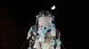 Participants climb up the bun tower during the bun snatching competition on the outlying Cheung Chau island in Hong Kong, Bun Festival. 