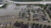 Permukiman warga terendam air akibat badai tropis Harvey di kota Spring, Texas (29/8).