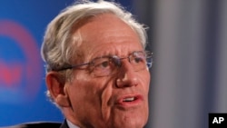 Former Washington Post reporter Bob Woodward speaks during an event sponsored by The Washington Post to commemorate the 40th anniversary of Watergate, June 11, 2012 at the Watergate office building in Washington.