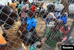 South Sudanese refugee families displaced by fighting arrive at Imvepi settlement in Arua district, northern Uganda, April 4, 2017.