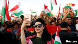 Ribuan warga Kurdi Irak di Erbil, Kurdistan turun ke jalan untuk menunjukkan dukungan bagi referendum kemerdekaan (22/9).