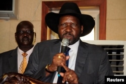 FILE - South Sudan's President Salva Kiir addresses delegates during the swearing-in ceremony of First Vice President Taban Deng Gai at the Presidential Palace in Juba, July 26, 2016.