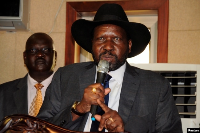 South Sudan's President Salva Kiir addresses delegates during the swearing-in ceremony of First Vice President Taban Deng Gai at the Presidential Palace in Juba, July 26, 2016.