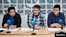 Vittus Qujaukitsoq the leader of Nunatta Qitornai party, from left, Kim Kielsen, chairman of Siumut, and Siverth K. Heilmann, the leader of Atassut party, are pictured in Nuuk, Greenland, Oct. 2, 2018. 