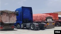 In this screen grab of a video verified by VOA Persian, trucks sit idle in the western Iranian city of Kangavar, May 30, 2018, as drivers participate in a 9-day-old nationwide truckers' strike.