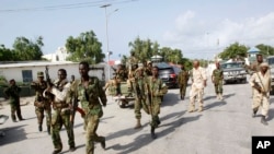 FILE - Somali soldiers patrol the streets in Mogadishu.