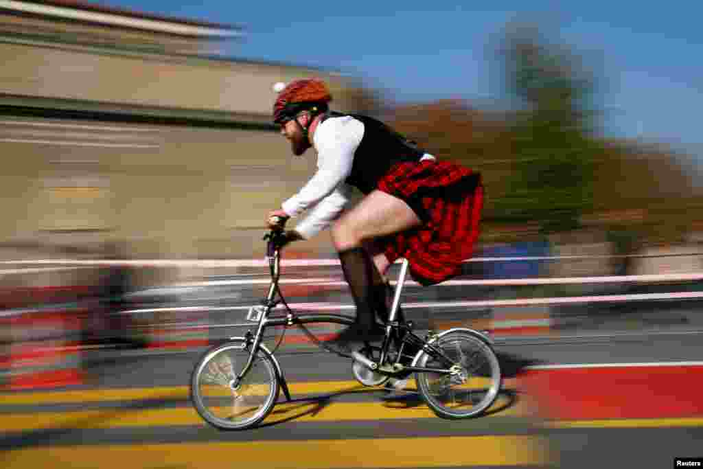 A cyclist races in the Brompton World Championship in Bern, Switzerland, Oct. 21, 2018.