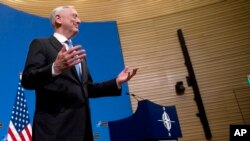 U.S. Secretary for Defense Jim Mattis speaks during a media conference after a meeting of NATO defense ministers at NATO headquarters in Brussels, June 8, 2018.