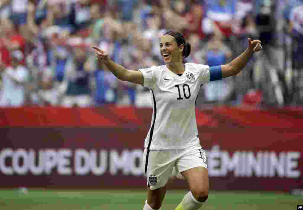 United States&#39; Carli Lloyd celebrates after scoring her third goal against Japan during the first half of the FIFA Women&#39;s World Cup soccer championship in Vancouver, British Columbia, July 5, 2015.