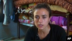 Yazidi refugee, Ashwaq Haji Hami says was enslaved by Islamic State militants in 2014, but escaped and went to Germany where she ran into her captor again, so she returned to Iraq for safety.