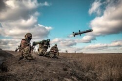 FILE - In this image released by the Ukrainian Defense Ministry Press Service, Ukrainian soldiers launch a U.S. Javelin missile during military exercises in Donetsk region, Ukraine, Dec. 23, 2021.