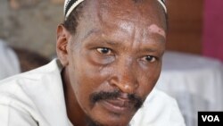 Jeronimo Lokolonyei Lorinyok, 51 - also known as Maalim Yusuf - a preacher, and a trainee with terror group in Somalia, said he was recruited by a terror suspect in police custody, Mombasa, Kenya, October 2013. (M. Yusuf/VOA)